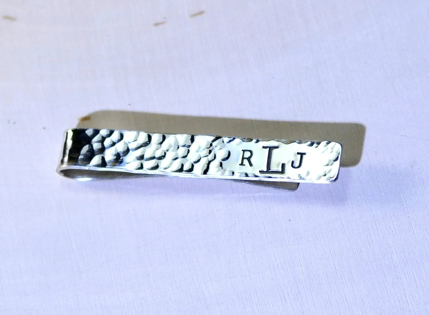 Hammered sterling silver tie clip with personalized monogram on tie bar