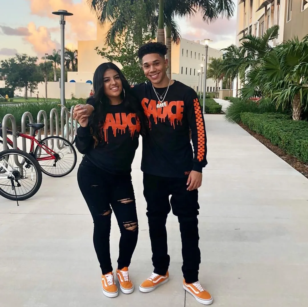 Orange Sauce | Black Long Sleeve Tee (Solid Checkered Drippin Sleeves)